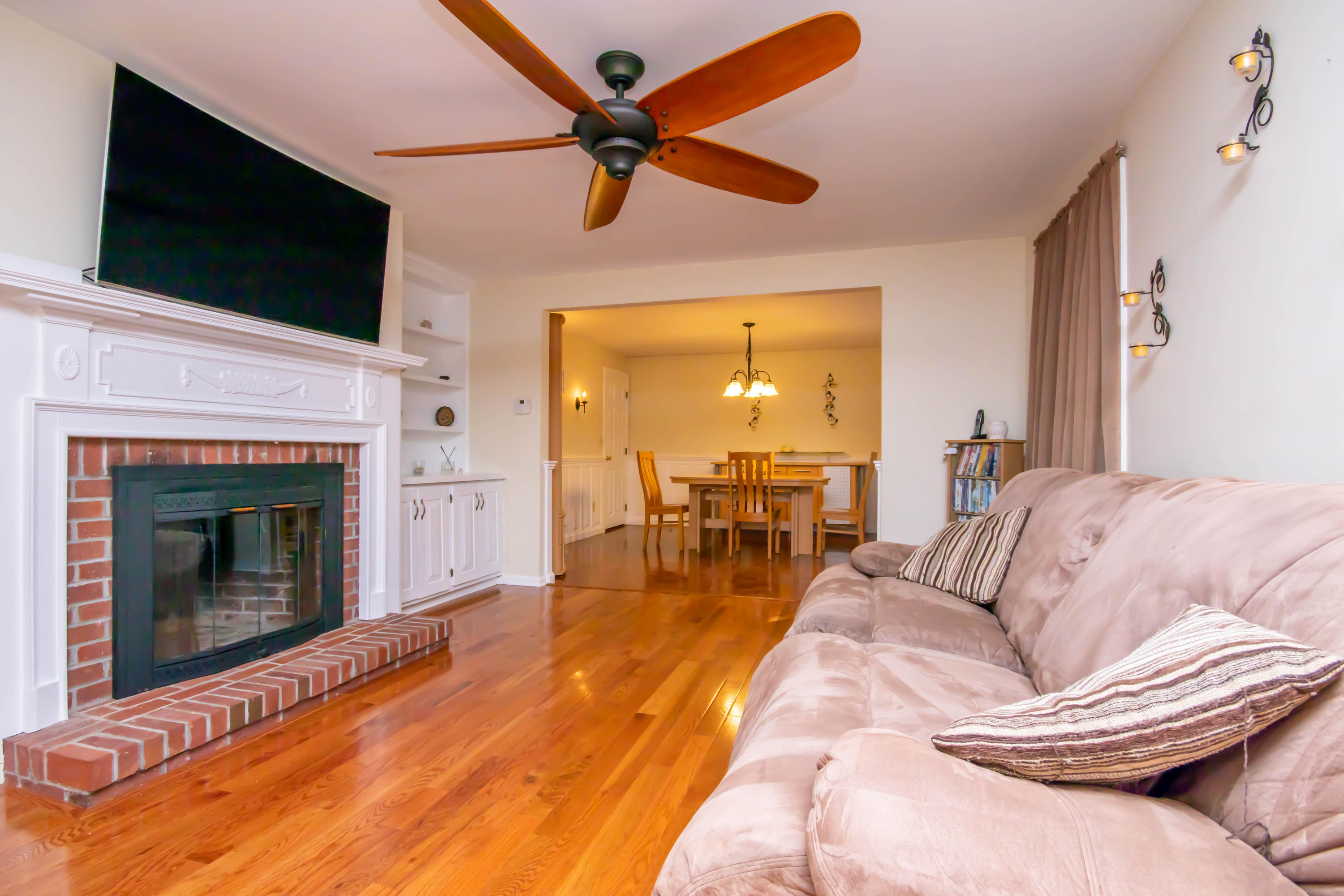 74 John Ewer Road Sandwich, MA 02563 - Photo 14 of 36 Living room with fireplace & built-ins