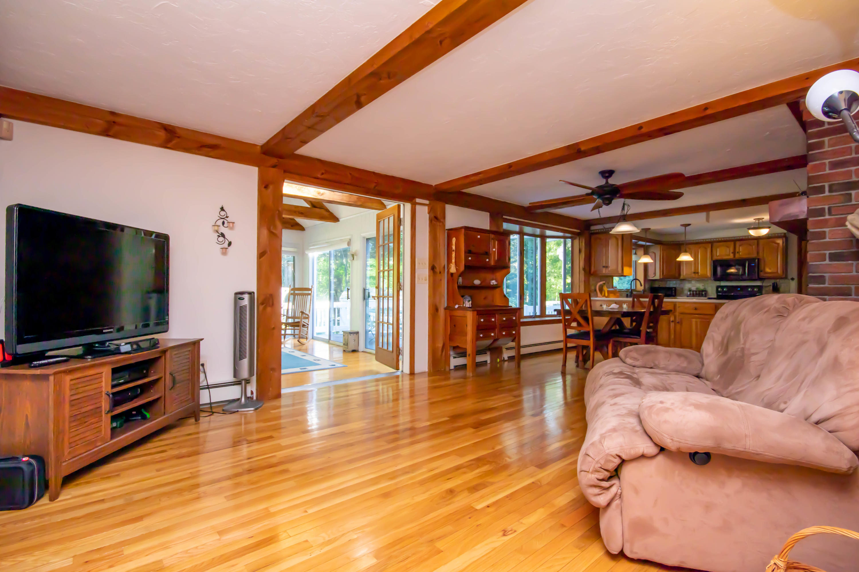 74 John Ewer Road Sandwich, MA 02563 - Photo 9 of 36 Sitting area opens to sunroom