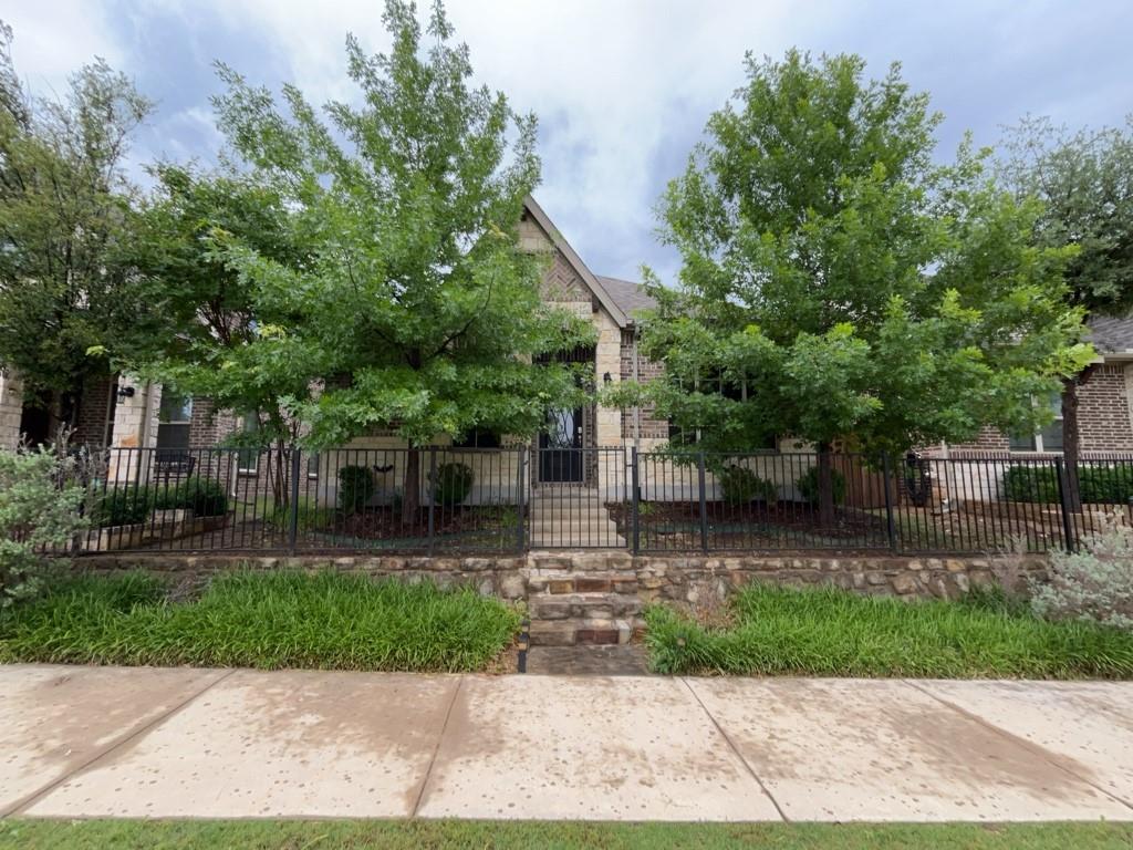 302 Julia Lane Euless, TX 76040 - Photo 1 of 1 a front view of a house with a yard and a garage