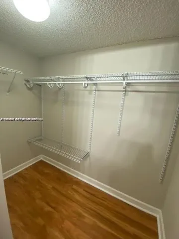 a view of a room with racks on the wall