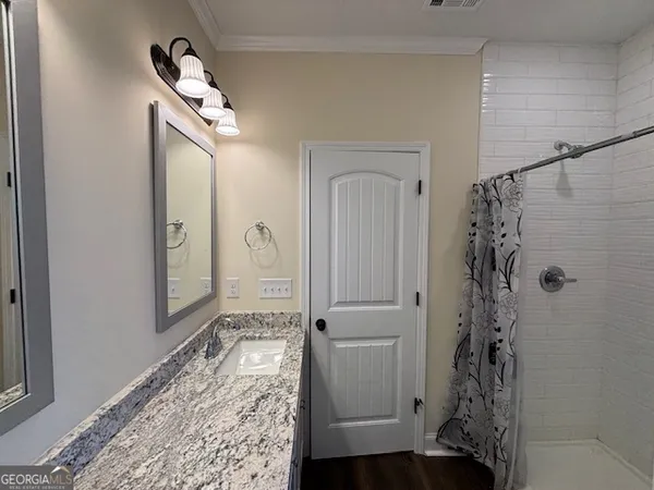 a bathroom with a bathtub
