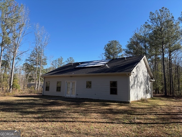 1234 Stapleton Acres Road Stapleton, GA 30823 - Photo 3 of 22 a view of a house with a backyard