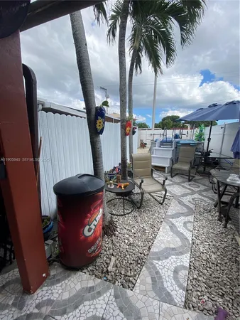 a view of outdoor space with seating area