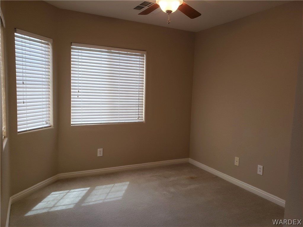 2803 Sunken Ship Street, Unit 89029 Laughlin, NV 89029 - Photo 13 of 35 an empty room with a window