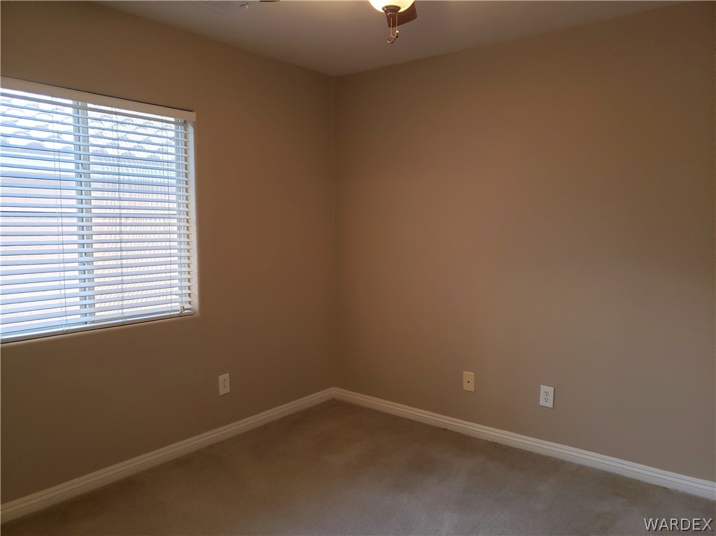 2803 Sunken Ship Street, Unit 89029 Laughlin, NV 89029 - Photo 15 of 35 an empty room with a window