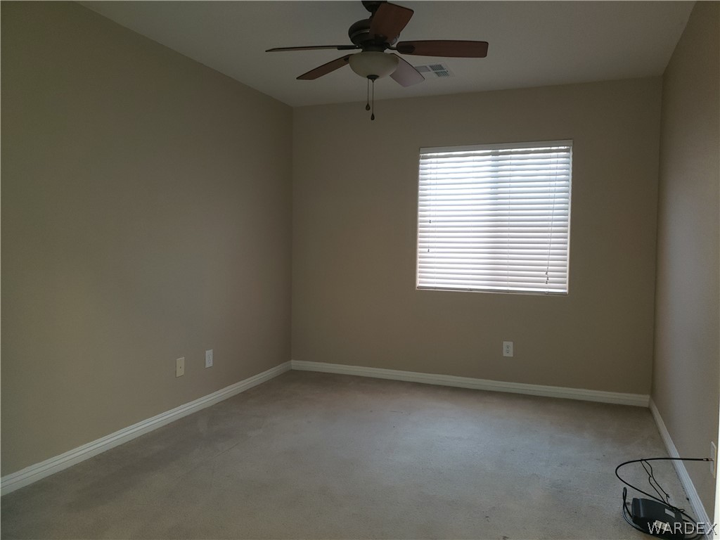 2803 Sunken Ship Street, Unit 89029 Laughlin, NV 89029 - Photo 17 of 35 an empty room with a window