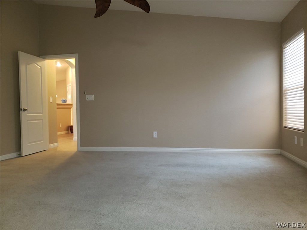 2803 Sunken Ship Street, Unit 89029 Laughlin, NV 89029 - Photo 21 of 35 an empty room with windows and closet