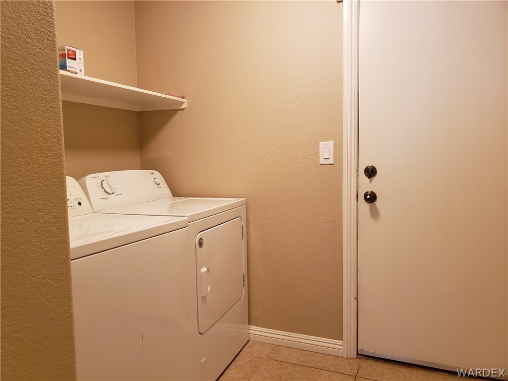 2803 Sunken Ship Street, Unit 89029 Laughlin, NV 89029 - Photo 28 of 35 a utility room with dryer and washer