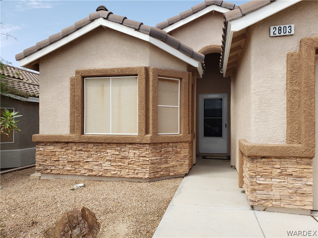 2803 Sunken Ship Street, Unit 89029 Laughlin, NV 89029 - Photo 3 of 35 a view of house with garage