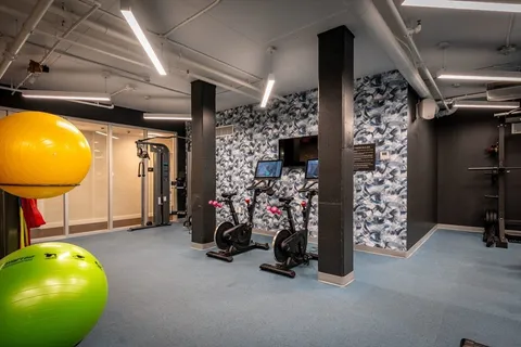 a view of a room with gym equipment