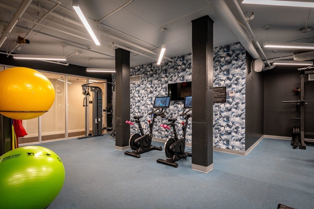 3 Hawkins Street, Unit 408 Somerville, MA 02143 - Photo 10 of 11 a view of a room with gym equipment