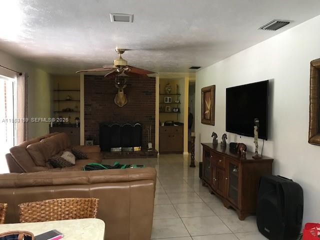 1221 Southwest Stakes Street Arcadia, FL 34266 - Photo 14 of 19 a living room with furniture and a flat screen tv
