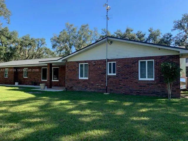 a house view with a garden space