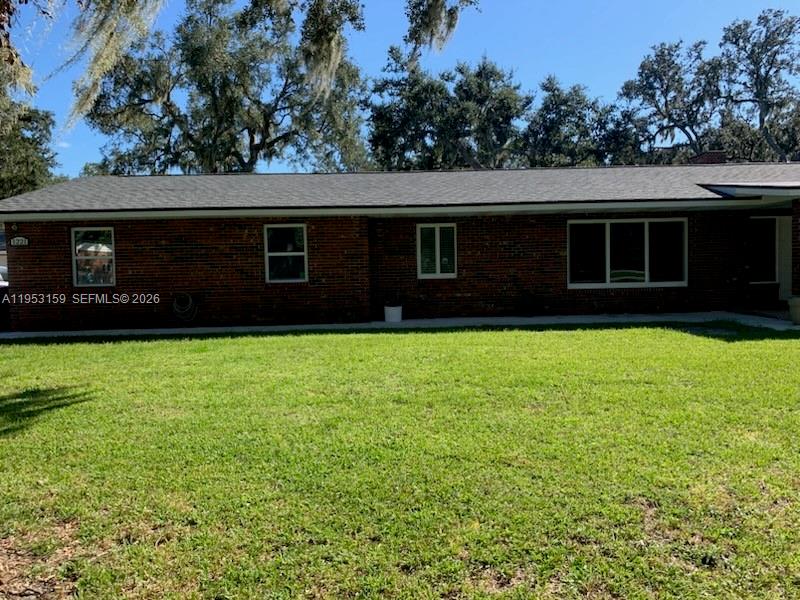 1221 Southwest Stakes Street Arcadia, FL 34266 - Photo 5 of 19 a house view with a garden space