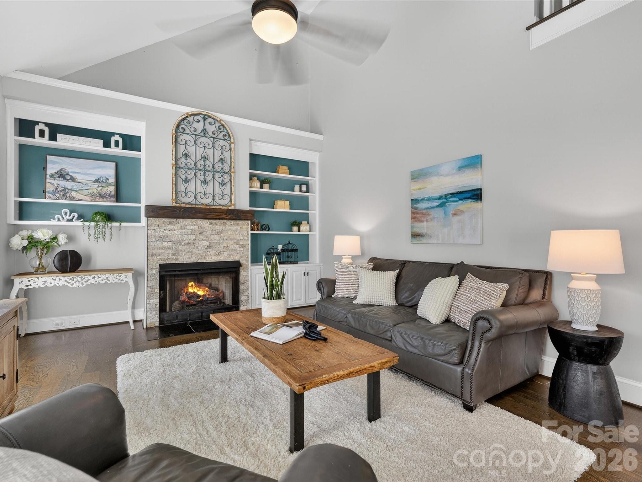 13446 Scanlan Way Davidson, NC 28036 - Photo 12 of 47 a living room with furniture and a fireplace