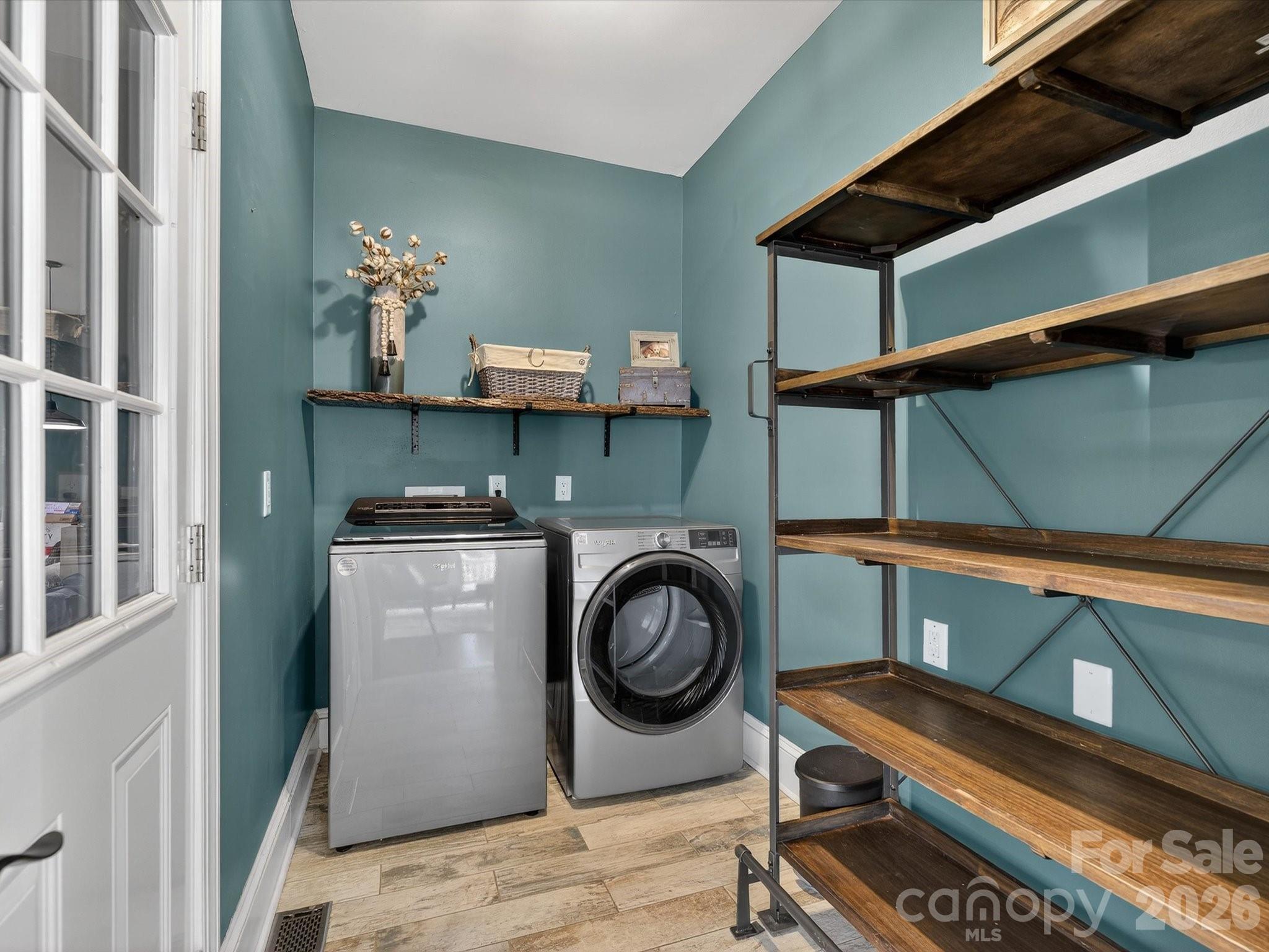 13446 Scanlan Way Davidson, NC 28036 - Photo 24 of 47 a utility room with dryer and washer