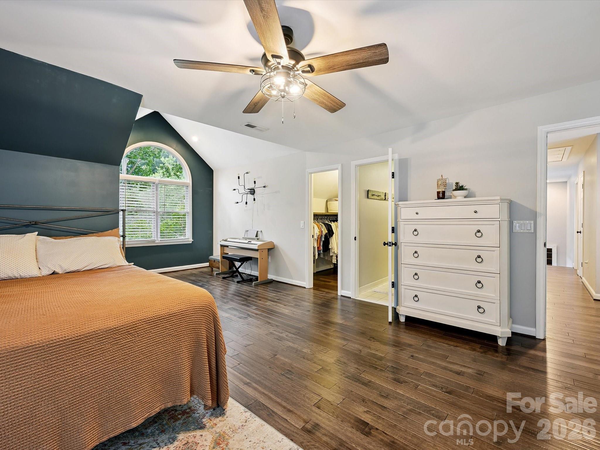 13446 Scanlan Way Davidson, NC 28036 - Photo 34 of 47 a bedroom with a bed and a dresser