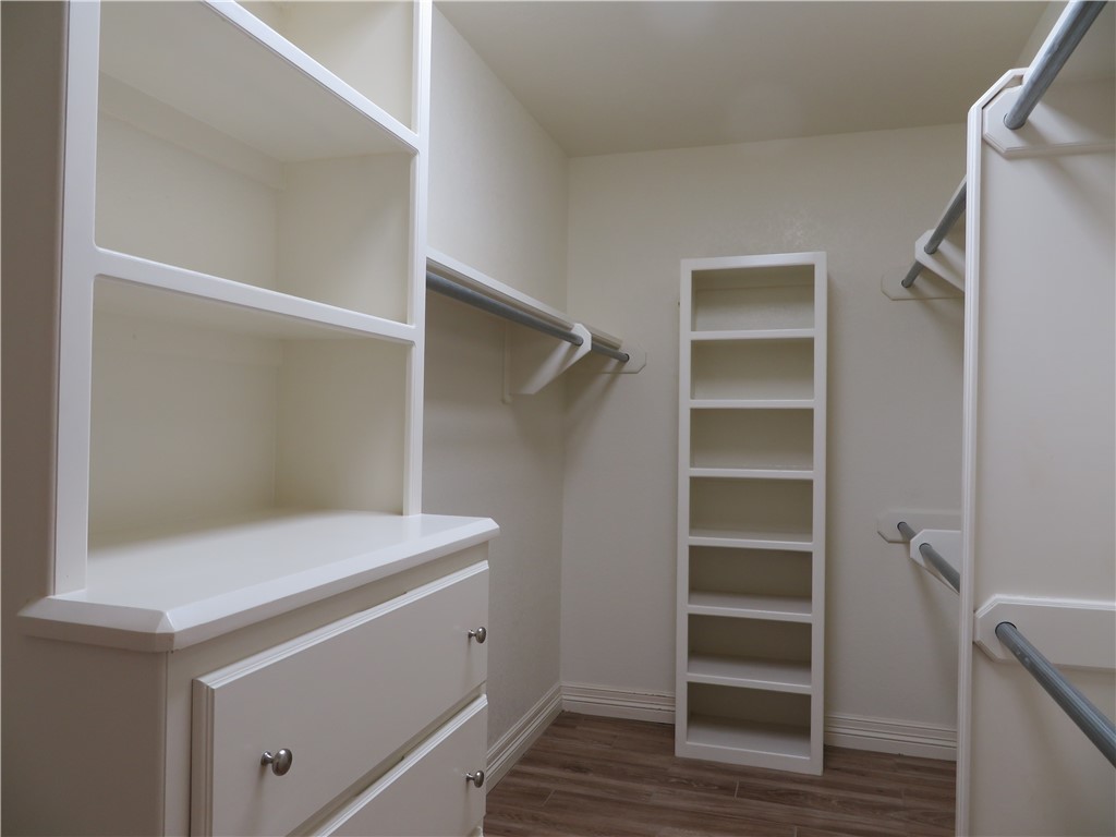 5803 South Oso Parkway Corpus Christi, TX 78414 - Photo 20 of 39 a view of walk in closet with empty racks