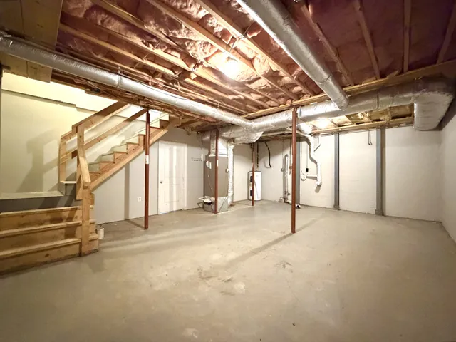 a balcony with wooden floor and trees