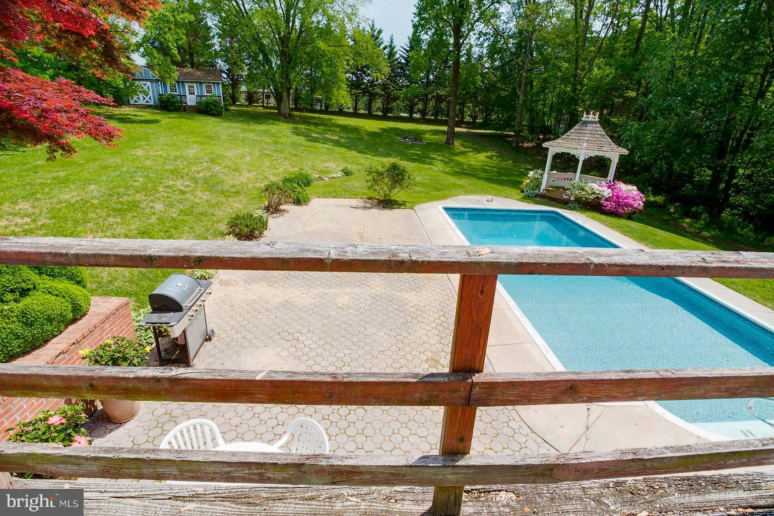 13301 Bottom Road Hydes, MD 21082 - Photo 50 of 62 Private balcony overlooks the pool and back yard