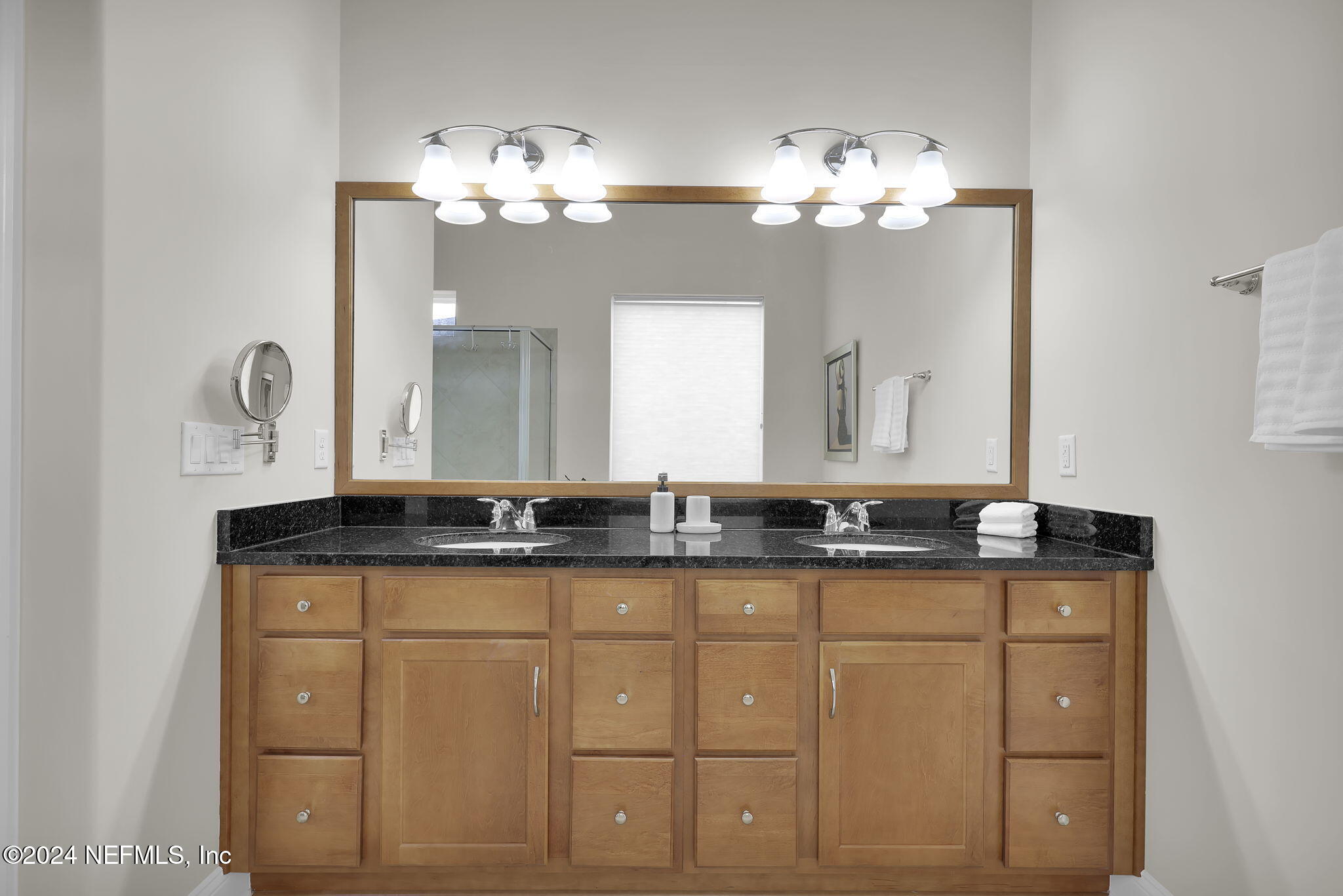 269 Gulfstream Way Ponte Vedra, FL 32081 - Photo 26 of 82 a bathroom with a granite countertop sink a large mirror and a