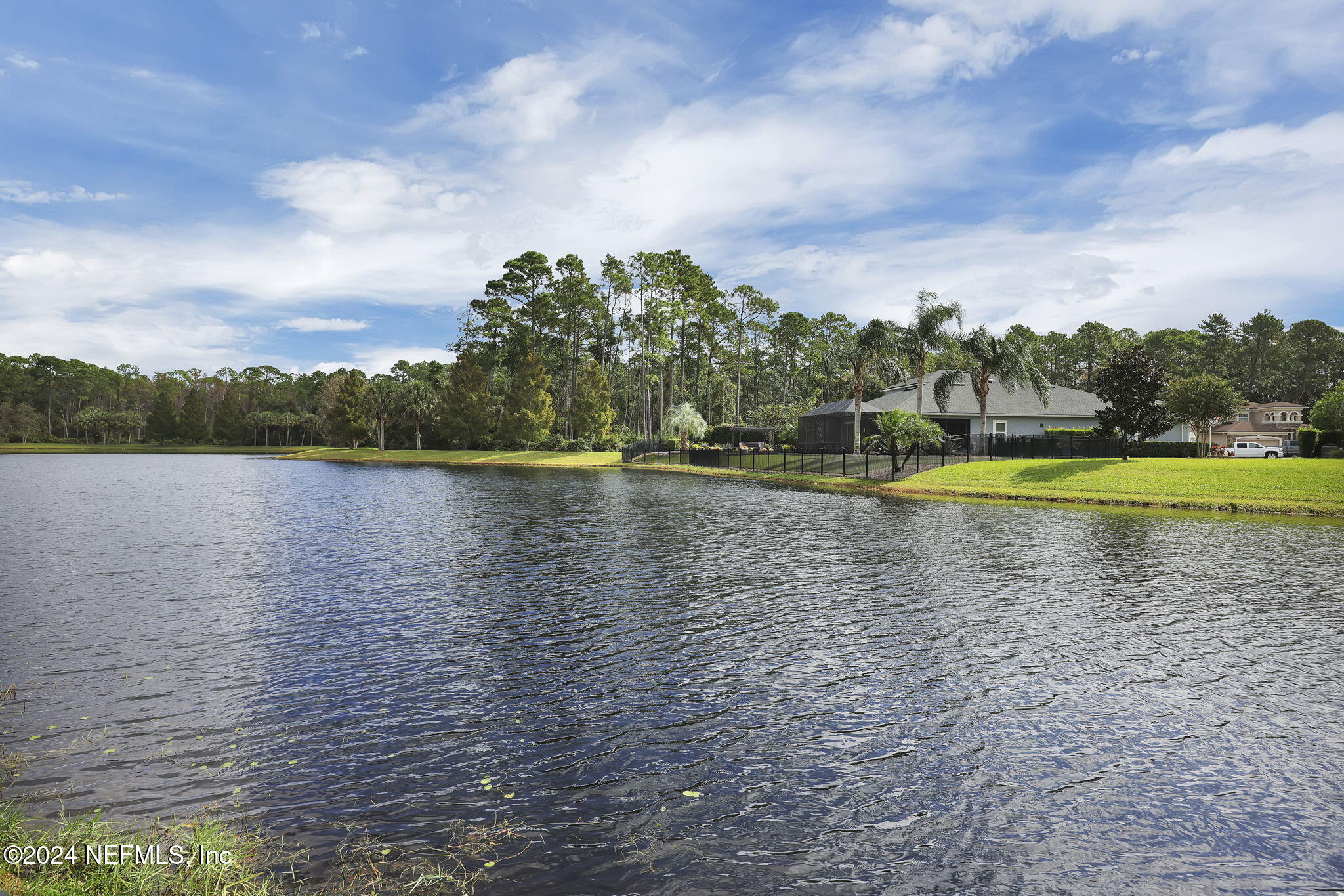 269 Gulfstream Way Ponte Vedra, FL 32081 - Photo 55 of 82 a view of a lake with houses in the back