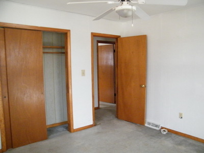 5095 Lewis Road Roanoke, VA 24014 - Photo 3 of 6 a view of an empty room with a ceiling fan