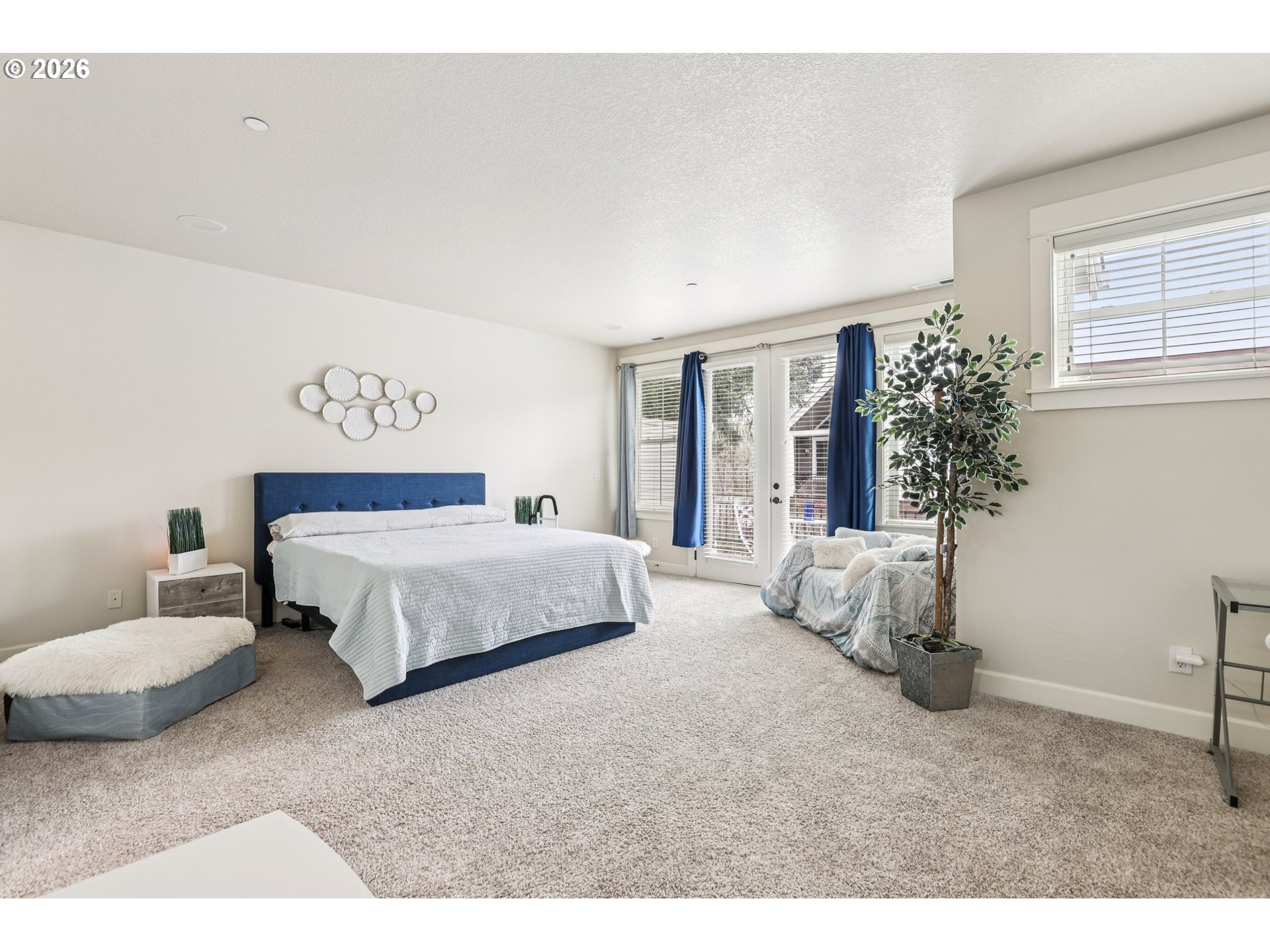 7812 Northwest Quinault Street Camas, WA 98607 - Photo 21 of 48 a bedroom with a bed and a couch