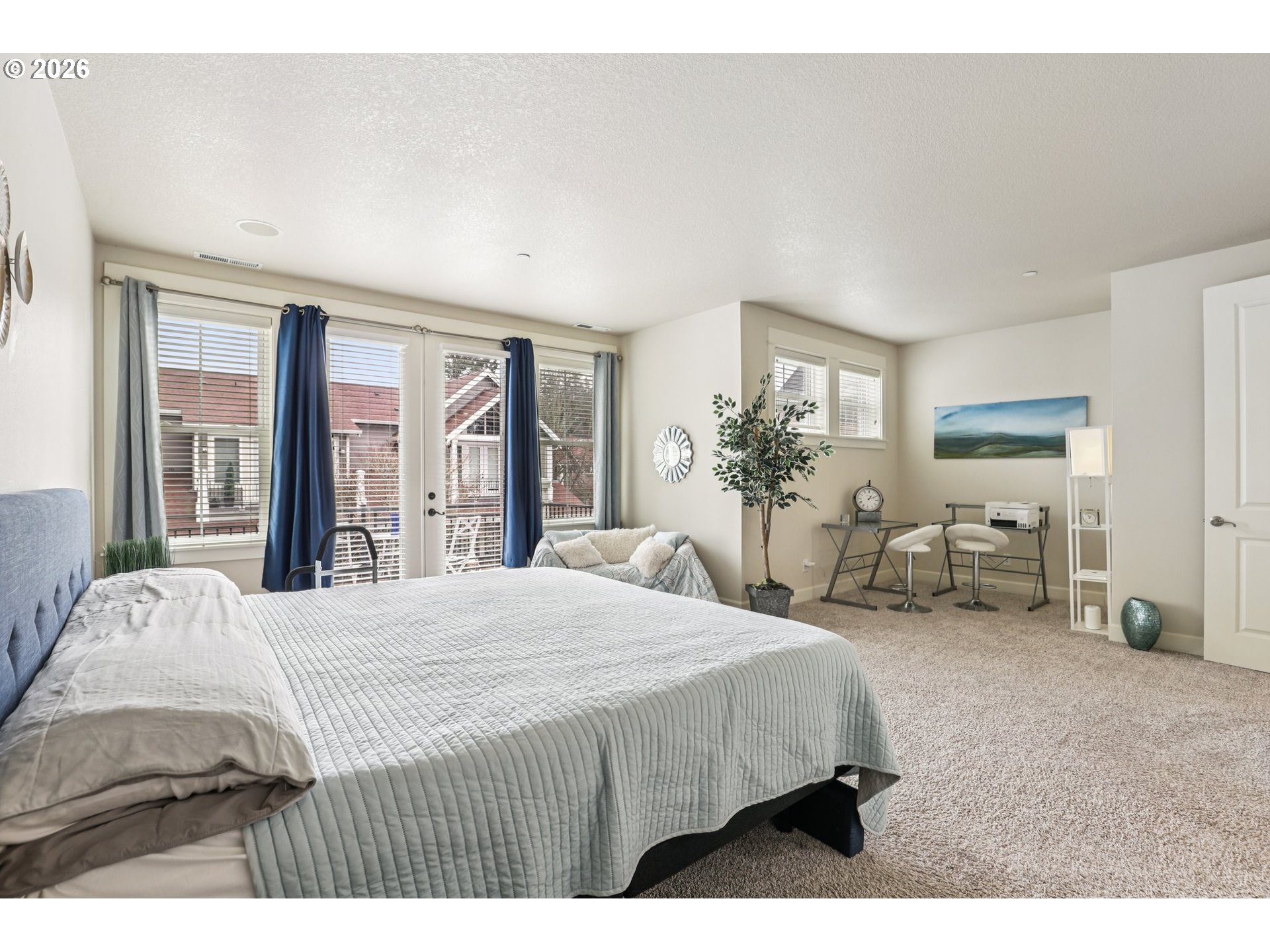 7812 Northwest Quinault Street Camas, WA 98607 - Photo 23 of 48 a bedroom with a bed couch and window