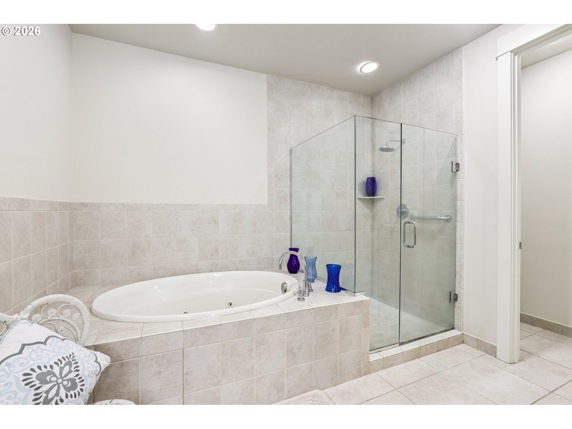 7812 Northwest Quinault Street Camas, WA 98607 - Photo 26 of 48 a bathroom with a tub and a shower
