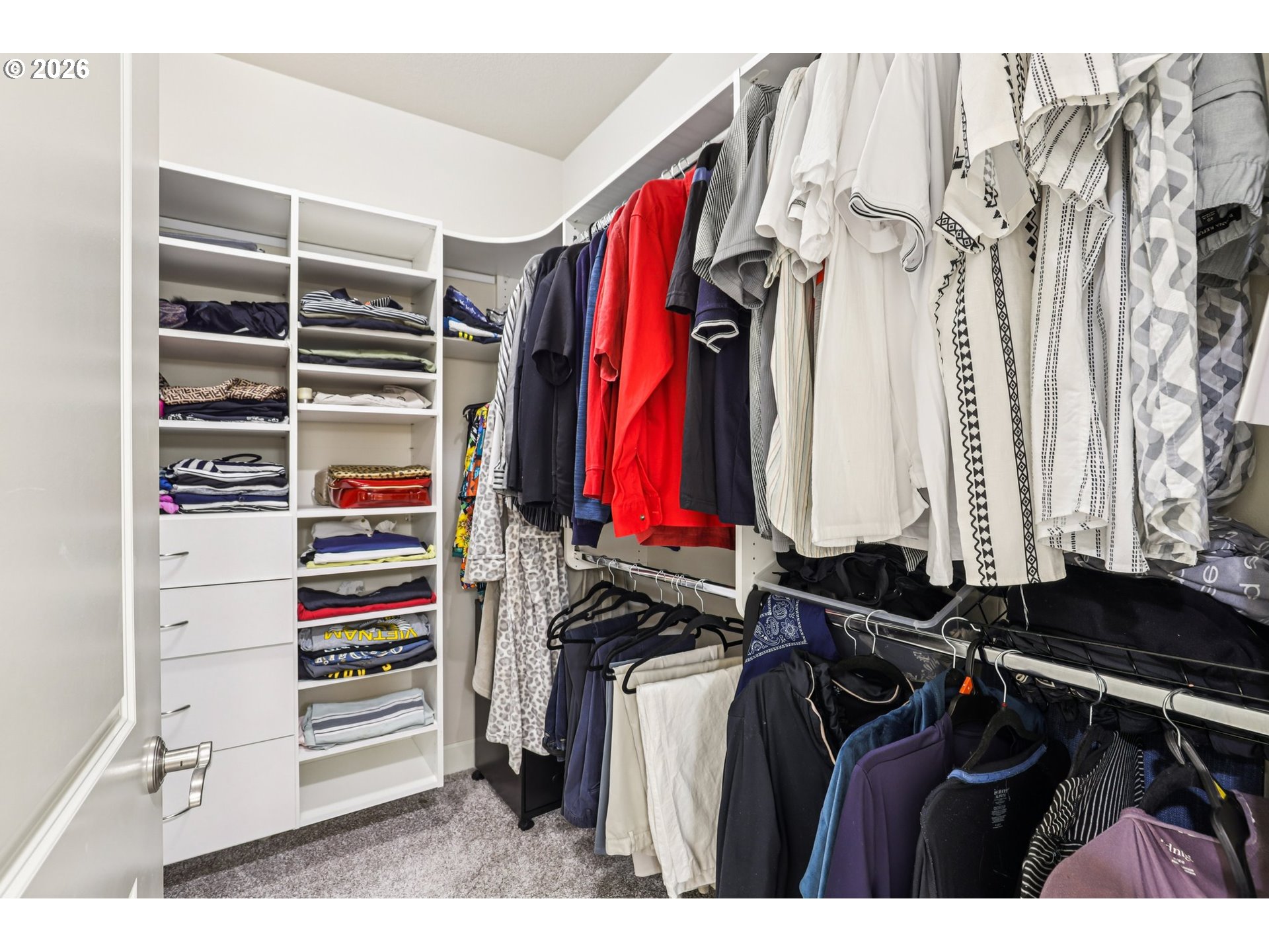 7812 Northwest Quinault Street Camas, WA 98607 - Photo 29 of 48 a view of walk in closet with clothes and shoes