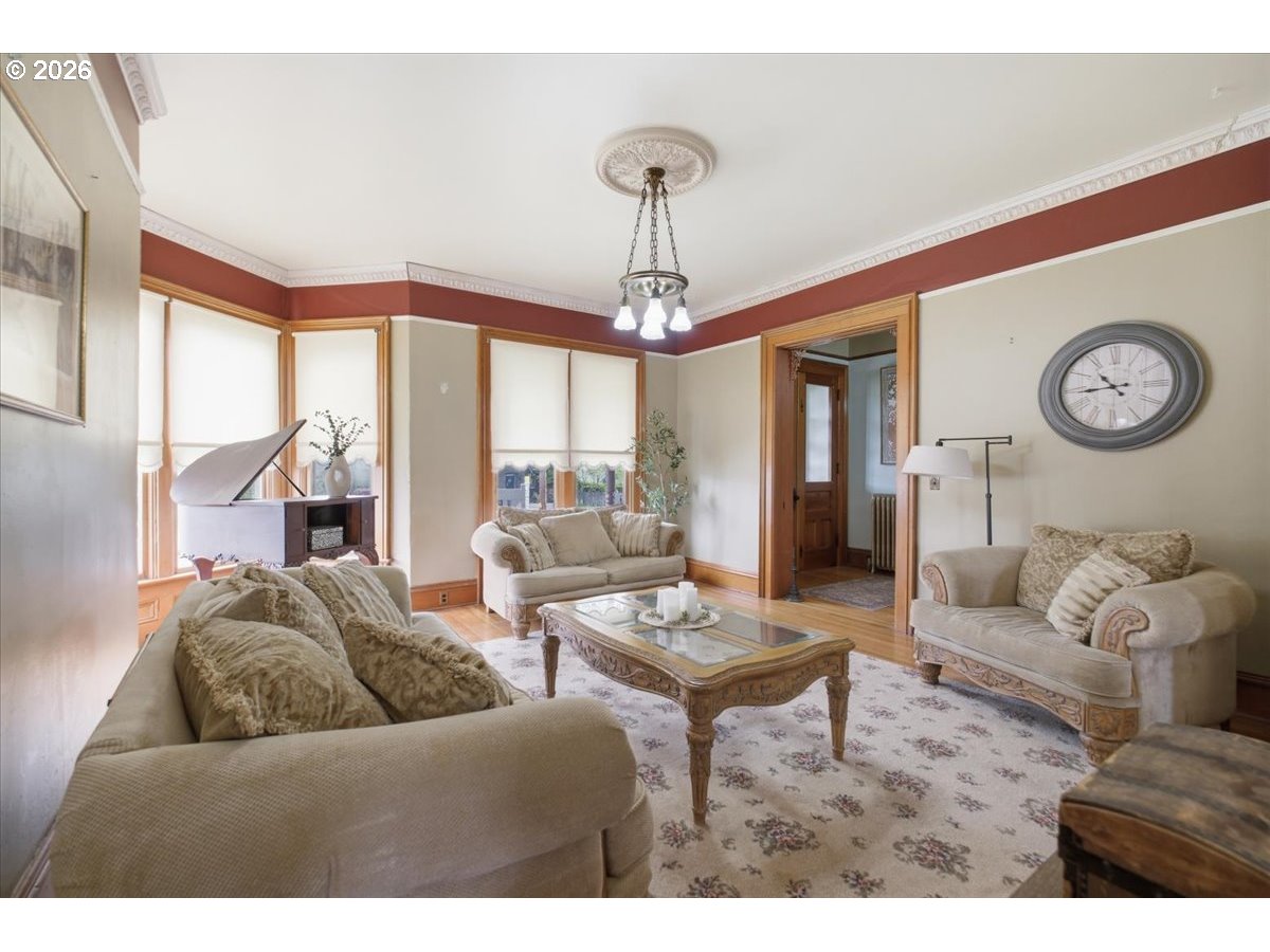 1121 Main Street Dallas, OR 97338 - Photo 11 of 48 a living room with furniture and a large window