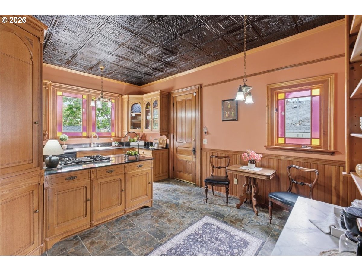 1121 Main Street Dallas, OR 97338 - Photo 15 of 48 a kitchen with a sink and cabinets