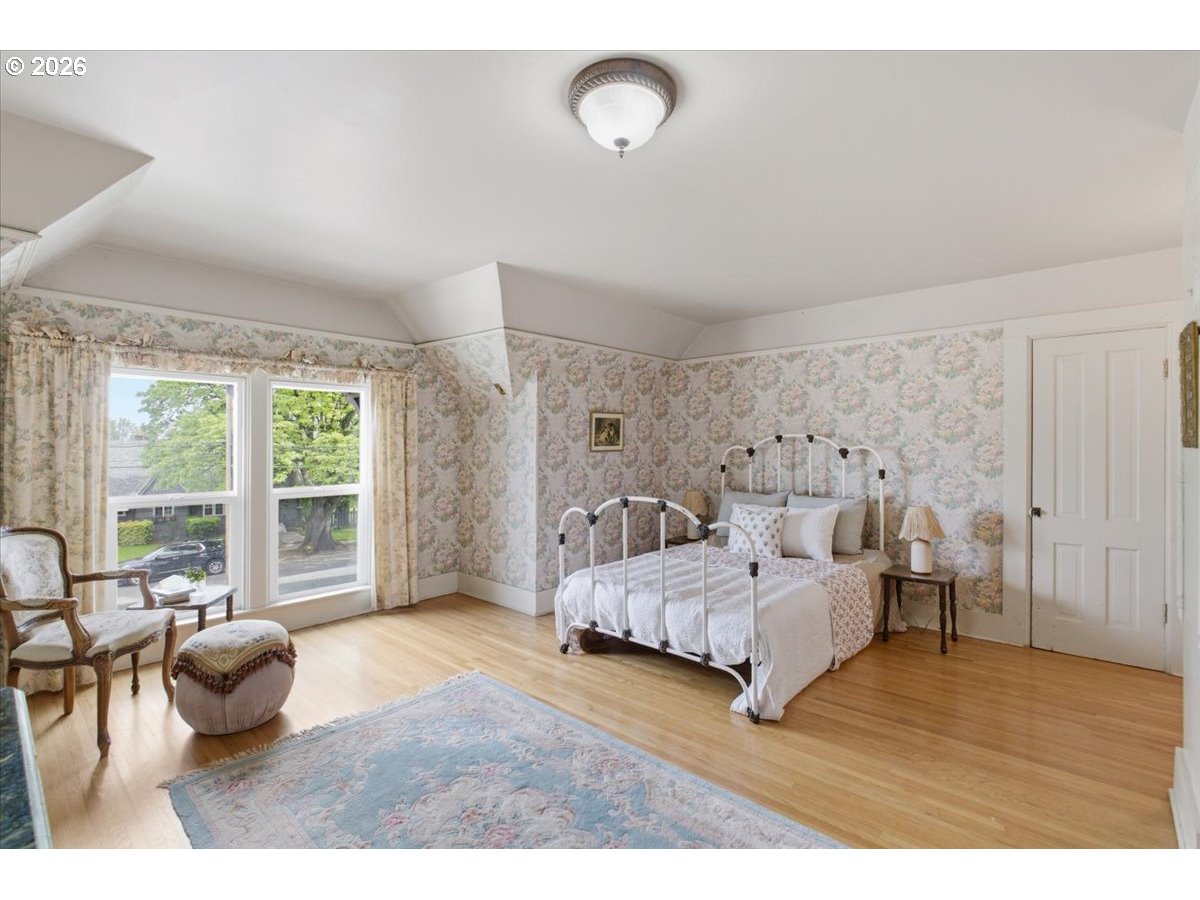 1121 Main Street Dallas, OR 97338 - Photo 29 of 48 a bedroom with furniture and a large window