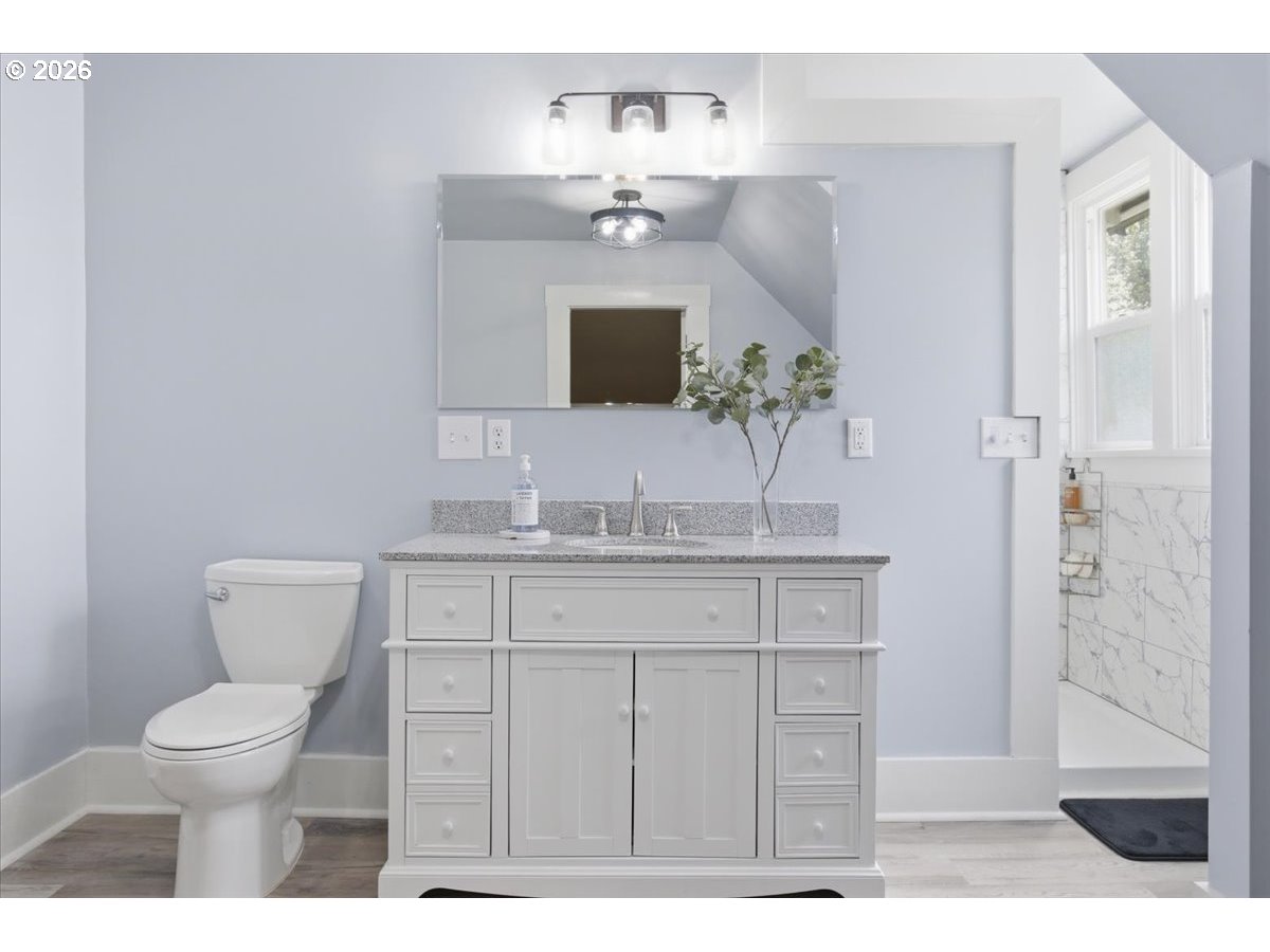 1121 Main Street Dallas, OR 97338 - Photo 35 of 48 a bathroom with a sink toilet and shower