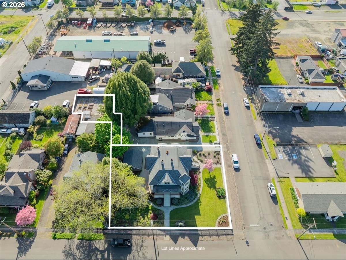 1121 Main Street Dallas, OR 97338 - Photo 42 of 48 an aerial view of a house with a swimming pool
