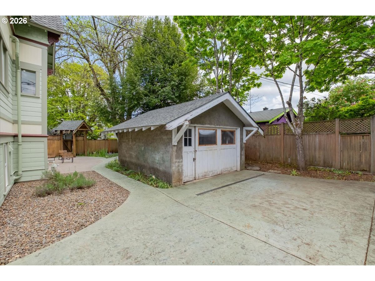 1121 Main Street Dallas, OR 97338 - Photo 43 of 48 a view of a small house in the back yard
