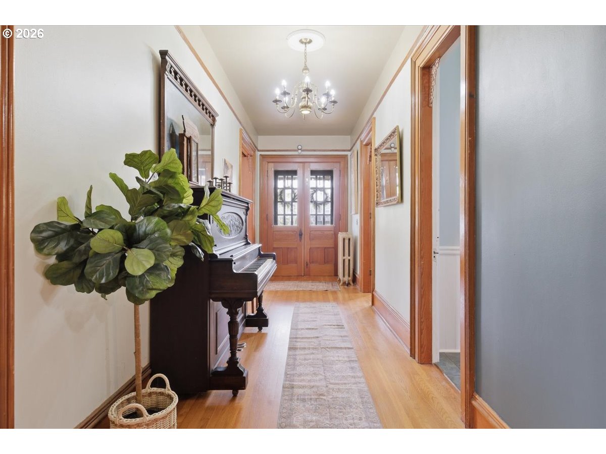 1121 Main Street Dallas, OR 97338 - Photo 9 of 48 a view of a hallway with flower pot