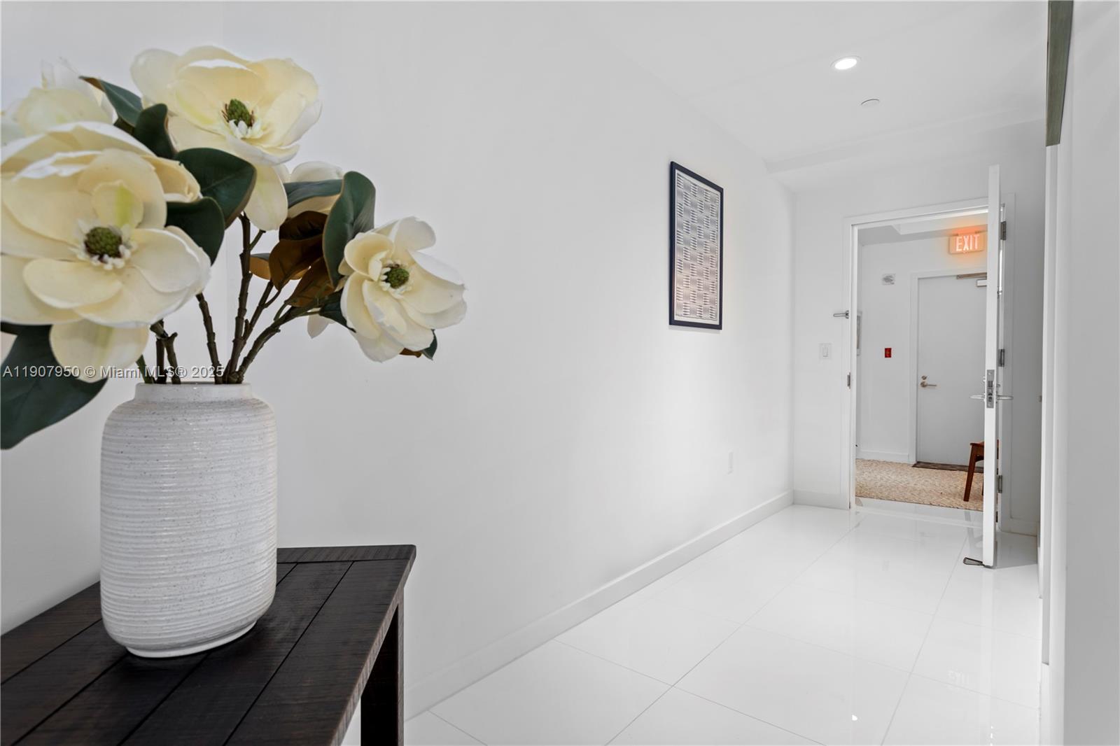 851 Northeast 1st Avenue, Unit 3907 Miami, FL 33132 - Photo 14 of 20 a view of hallway that has closet