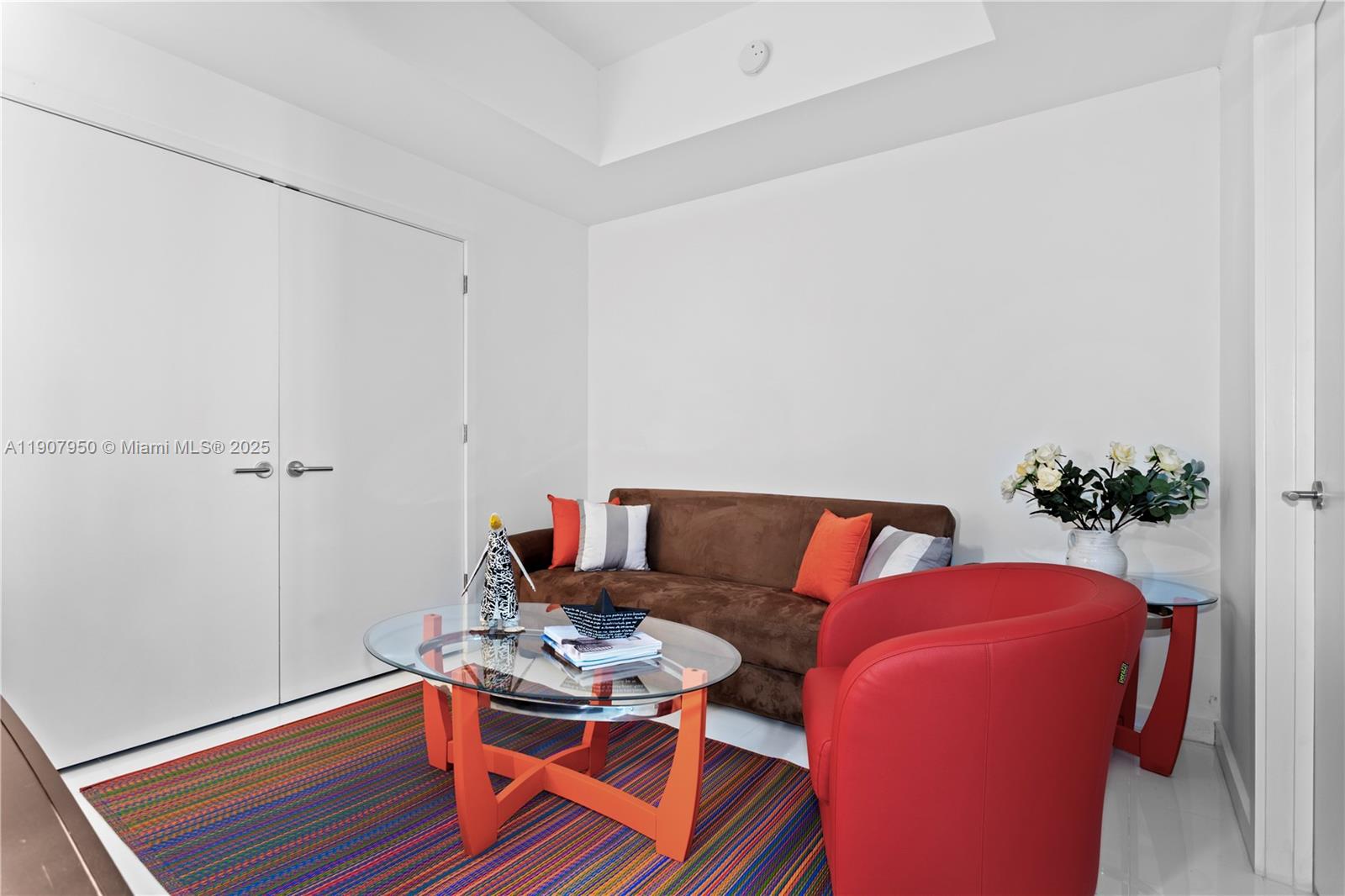 851 Northeast 1st Avenue, Unit 3907 Miami, FL 33132 - Photo 9 of 20 a living room with furniture and a potted plant