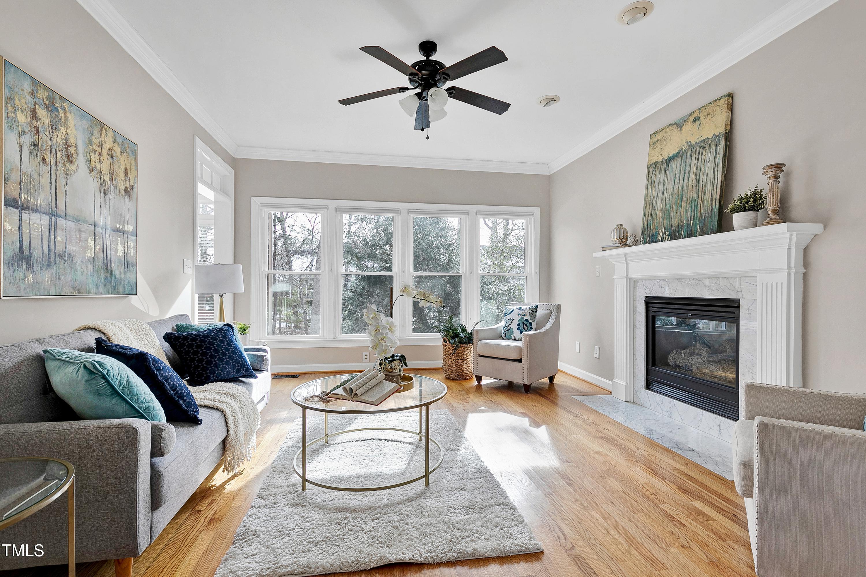 103 Sandy Hook Way Cary, NC 27513 - Photo 12 of 45 a living room with furniture and a fireplace