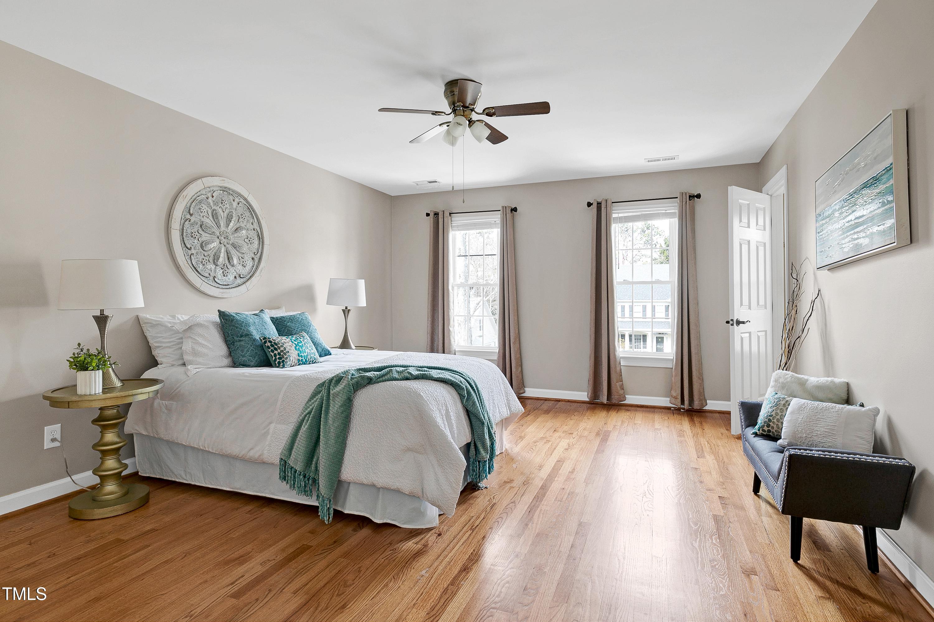 103 Sandy Hook Way Cary, NC 27513 - Photo 23 of 45 a living room with a bed furniture and a window
