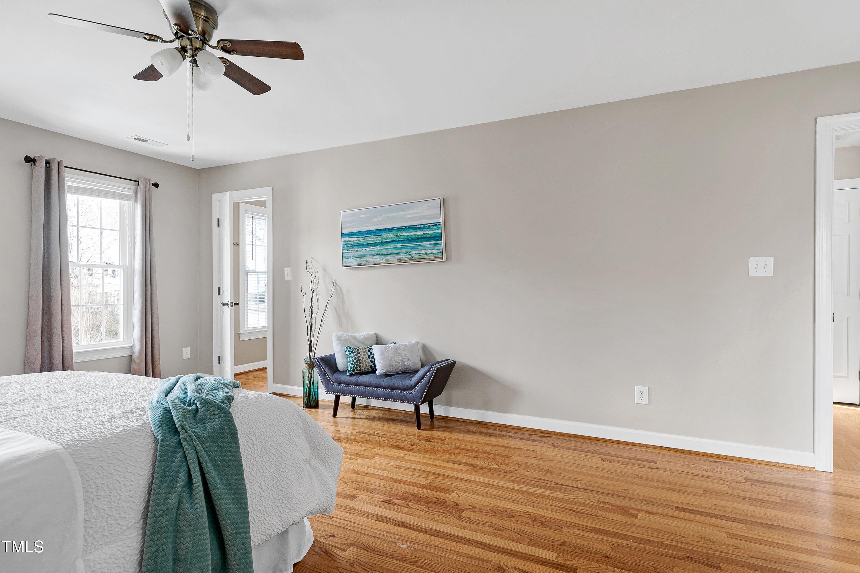 103 Sandy Hook Way Cary, NC 27513 - Photo 24 of 45 a living room with furniture and a wooden floor