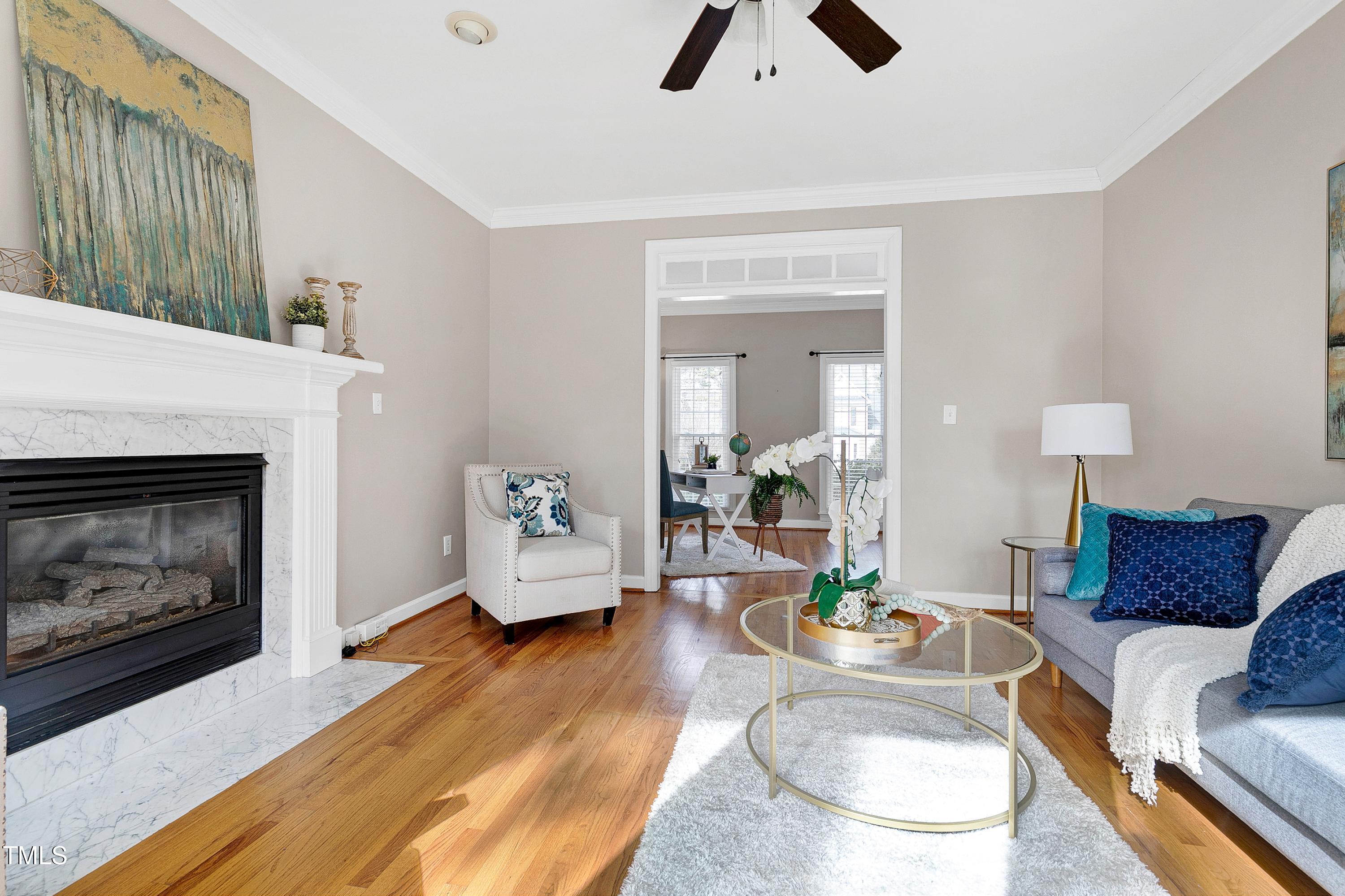 103 Sandy Hook Way Cary, NC 27513 - Photo 10 of 45 a living room with furniture and a fireplace