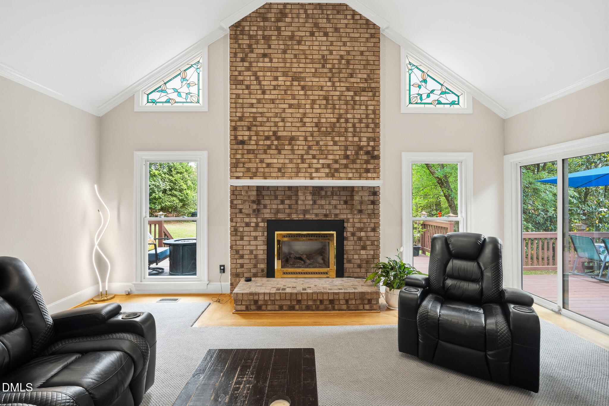 3735 Stoneybrook Drive Durham, NC 27705 - Photo 6 of 44 a living room with furniture and a fireplace