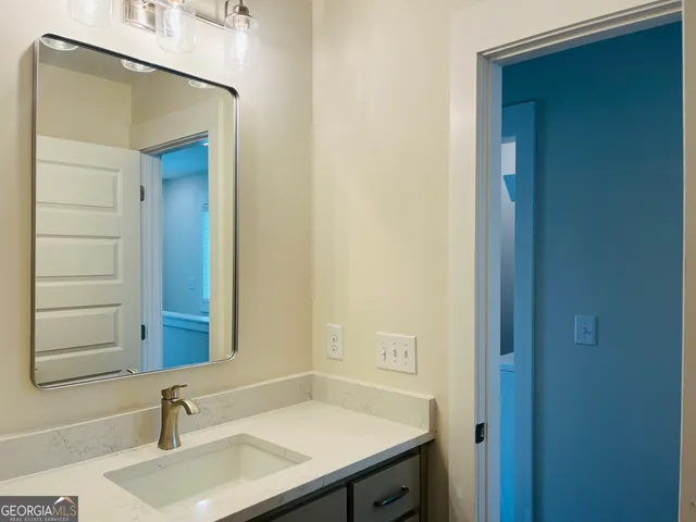 a view of washer and dryer with wooden floor