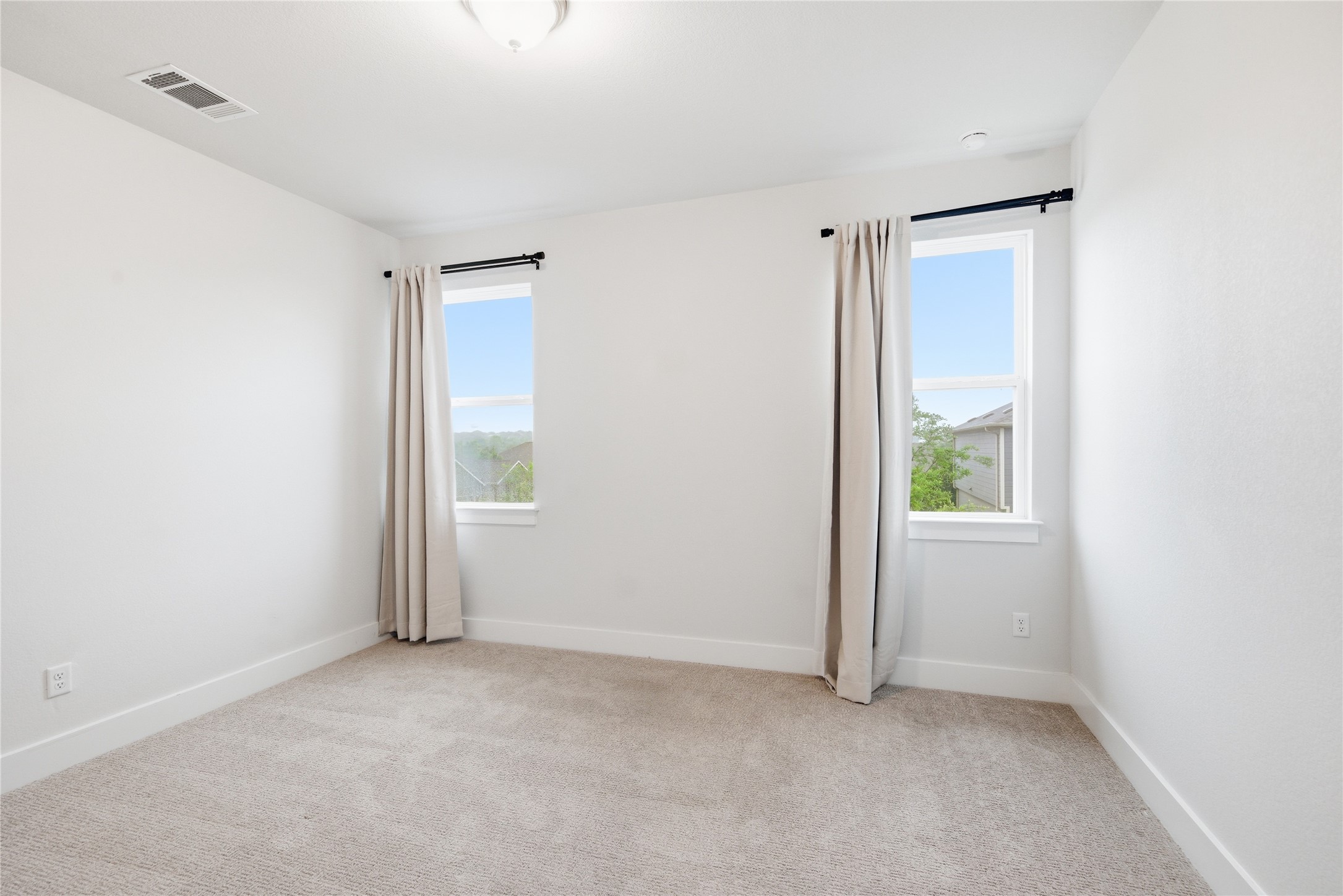 1300 Harwell Loop Kyle, TX 78640 - Photo 20 of 21 a view of an empty room with a window