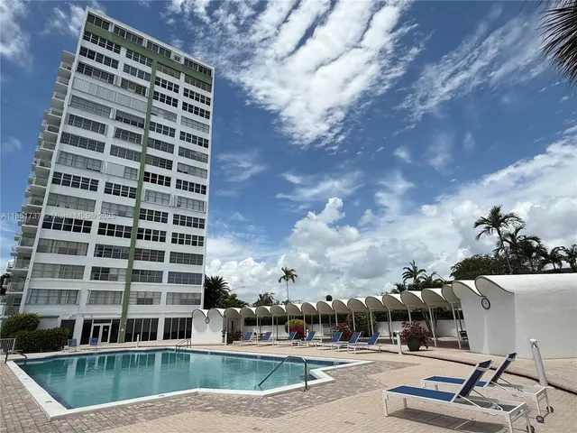 a view of a swimming pool with a terrace