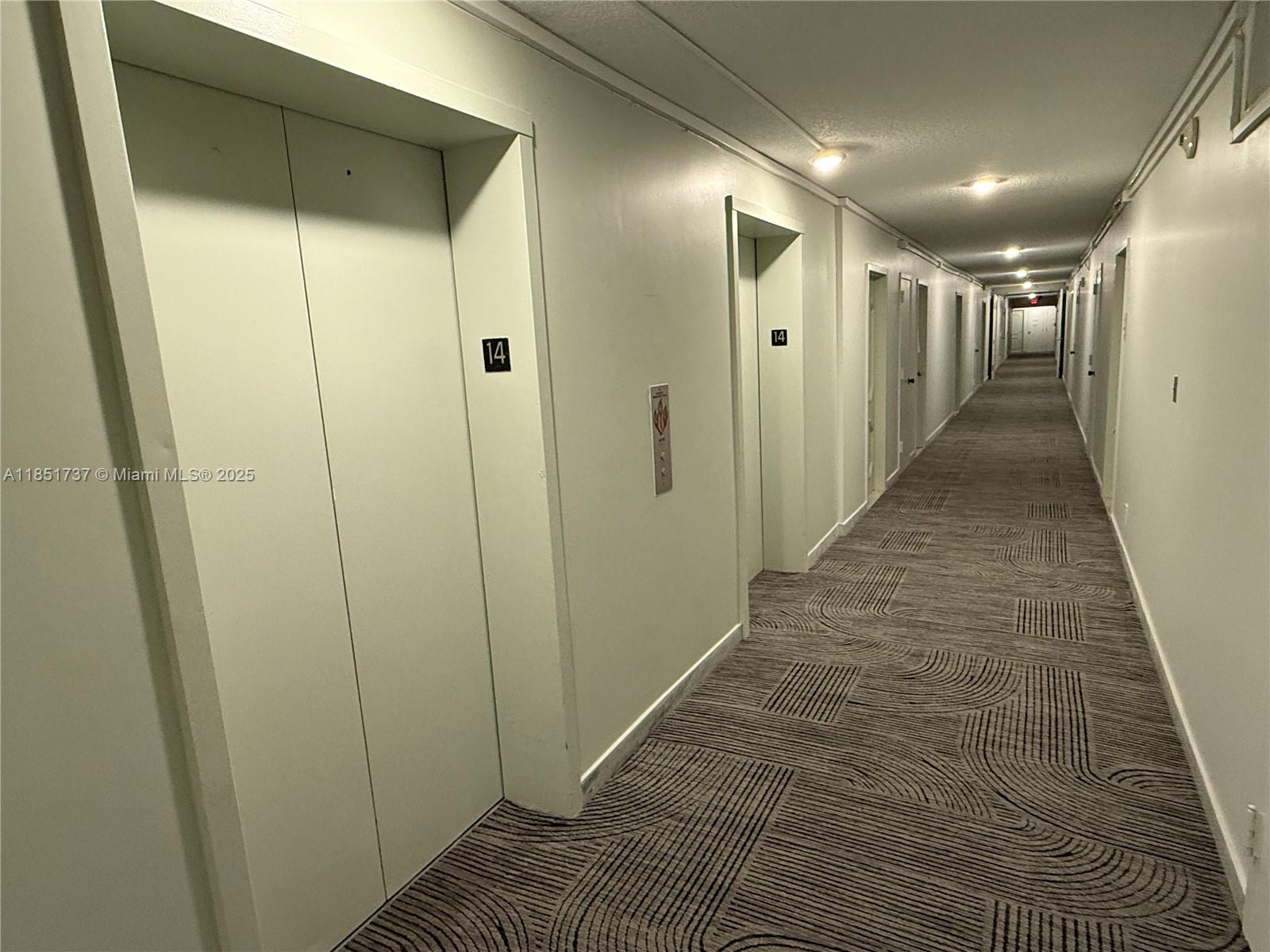 2100 Sans Souci Boulevard, Unit B1406 North Miami, FL 33181 - Photo 17 of 17 a view of hallway