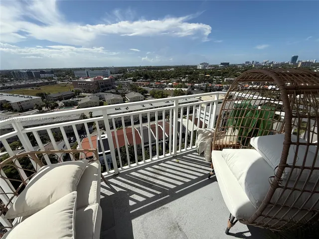a view of a chairs and table on the terrace